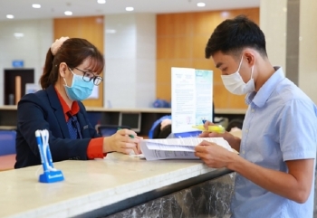 Ngân hàng không được cho vay để thanh toán tiền đặt cọc mua nhà, mua vàng miếng, xây nhà...
