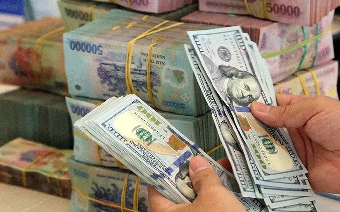 Điểm tin ngân hàng ngày 27/3: Điều chỉnh dự báo tỷ giá USD/VND do thay đổi kinh tế toàn cầu