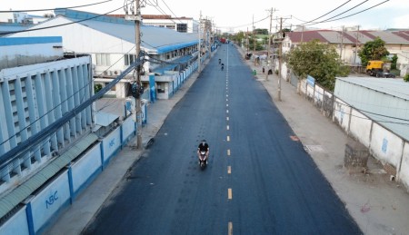 [Chùm ảnh] Đường đầy hố sâu hơn nửa mét ở TP HCM “thay áo mới”