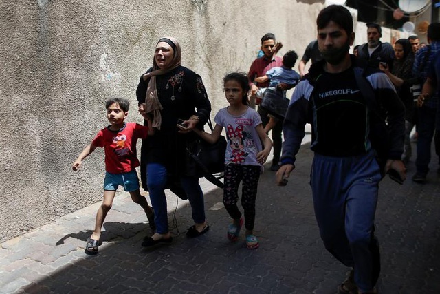 Dải Gaza chìm trong khói lửa, thùng thuốc súng Trung Đông nóng trở lại - 14 Dải Gaza chìm trong khói lửa, thùng thuốc súng Trung Đông nóng trở lại - 14