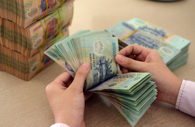 157.000 tỷ đồng sắp được bơm ra thị trường - 1