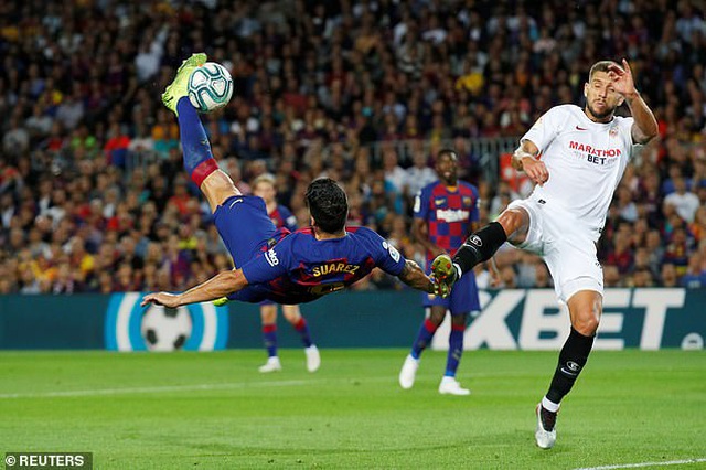 messi va luis suarez ruc sang barcelona thang dam sevilla