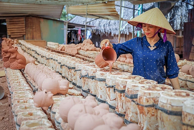 lang gom lam chuot vang mua tet
