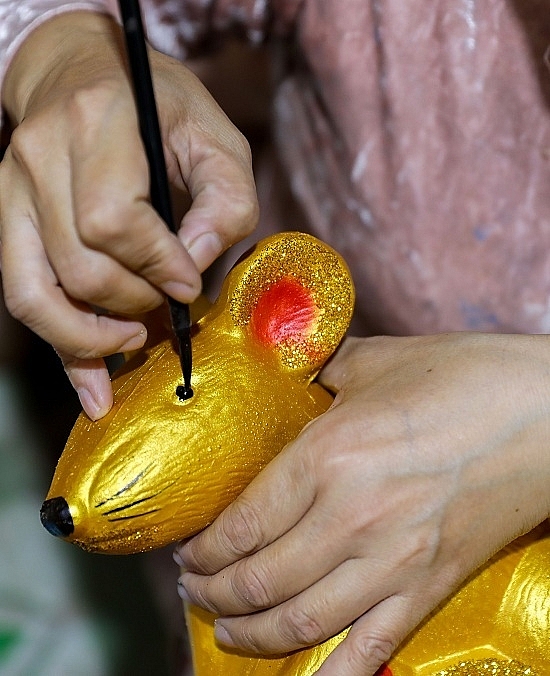 lang gom lam chuot vang mua tet