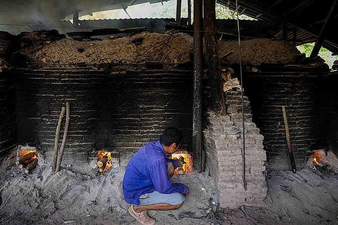 lang gom lam chuot vang mua tet