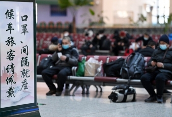 Trung Quốc kêu gọi dân "ở đâu, yên đó", đón Tết qua mạng