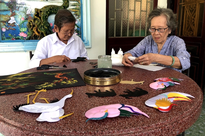 hon 60 nam giu nghe tranh goi vai