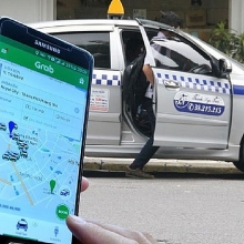 sap nhap grab uber khong vi pham luat canh tranh