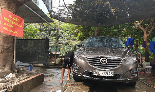 200.000 đồng một lần rửa ôtô ngày 29 Tết