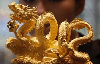 Giá vàng hôm nay 22/3: Đồng USD dồn ép giá vàng