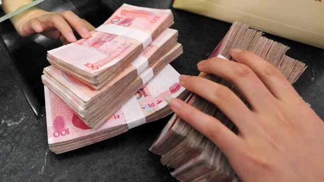Ngân hàng Trung Quốc đe dọa trừng phạt những người quay lưng với tiền mặt