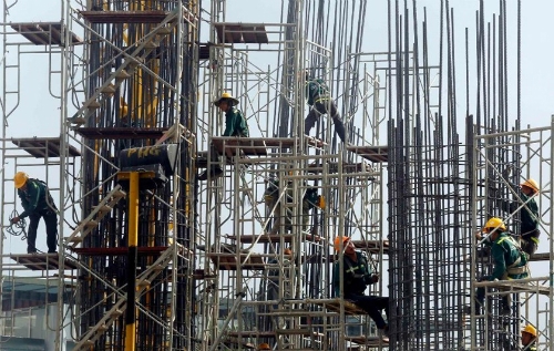 Fitch cảnh báo rủi ro từ chính sách tiền tệ của Việt Nam