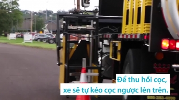 Cỗ xe đặt và thu dọn cọc giao thông tự động